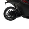 Close-up of a black motorcycle's rear wheel and suspension system.