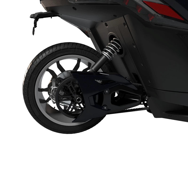 Close-up of a black motorcycle's rear wheel and suspension system.