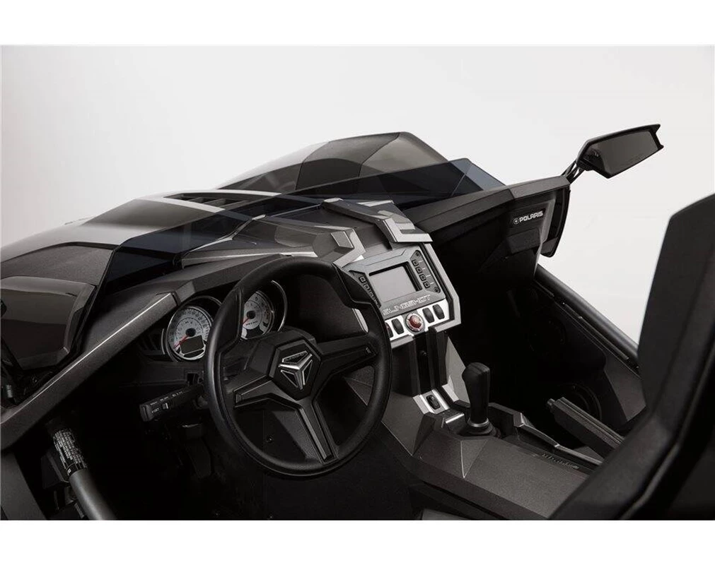 Interior of a luxury sports car showcasing its steering wheel and dashboard.