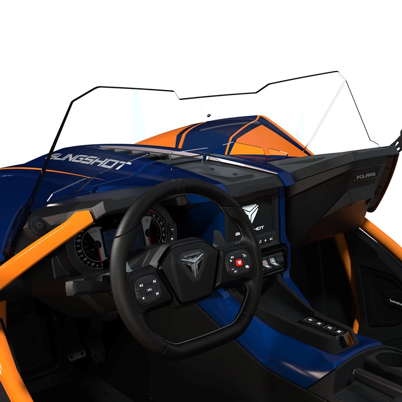 Interior view of a modern car with a sporty steering wheel and digital dashboard.