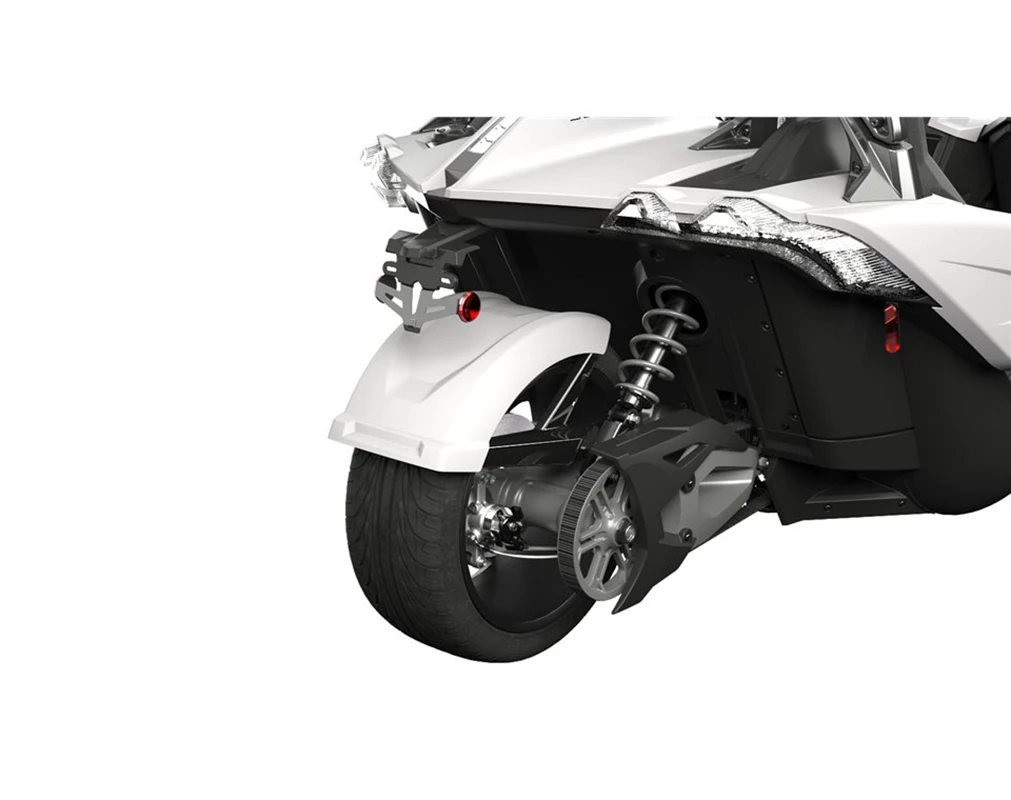 Close-up of a scooter's rear wheel and suspension system.