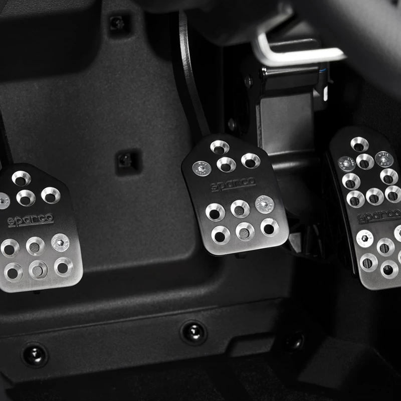 2882334-468_alternate_19 Close-up of three metallic car pedals in a vehicle.