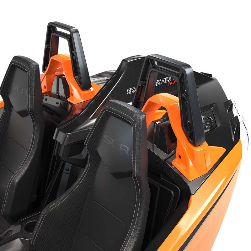 Close-up of black and orange seats in a vehicle or simulator.