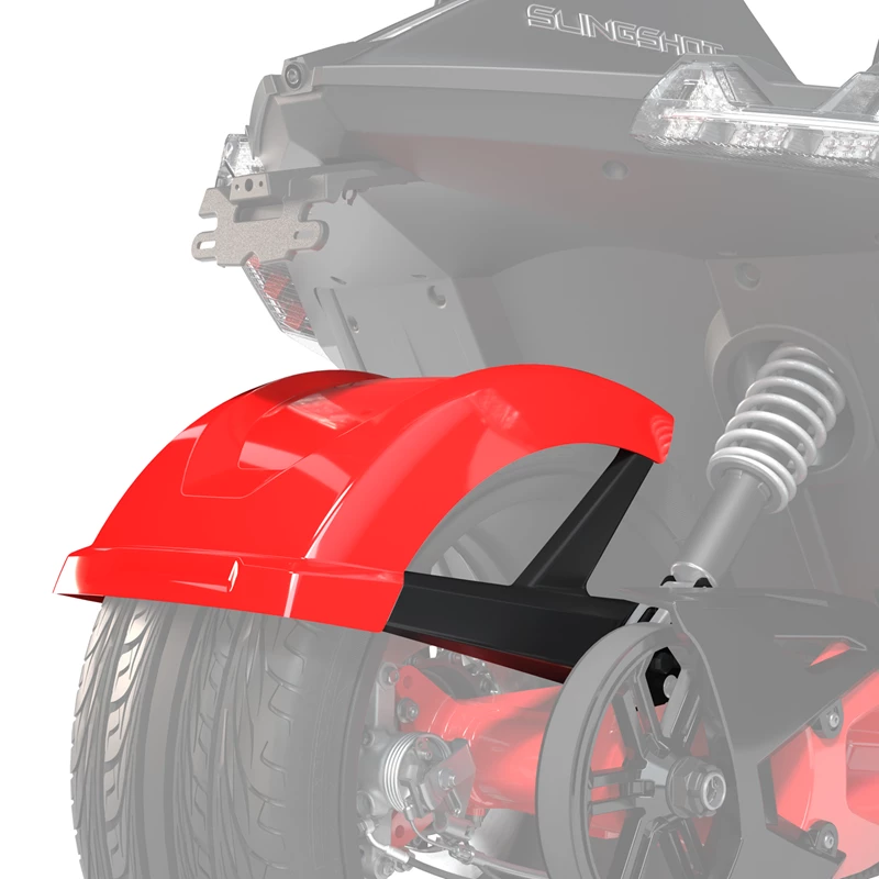 Close-up of a red motorcycle rear fender and suspension.