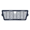 Black honeycomb car grille with a sleek design.