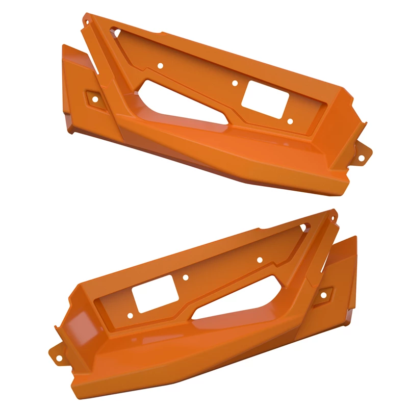 Two orange plastic car bumper parts with cutouts.