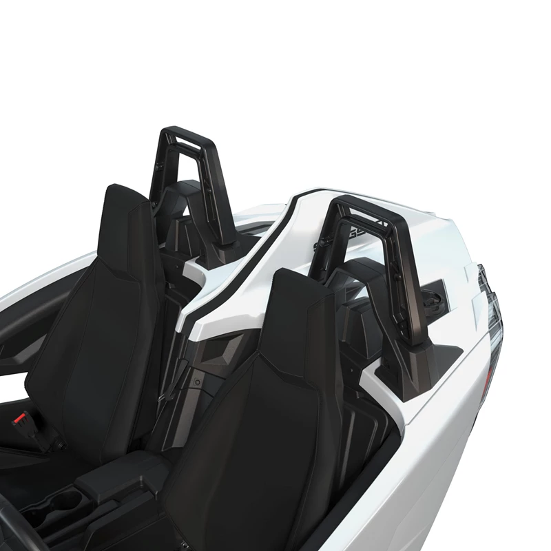 Two black seats in a modern, white vehicle interior.