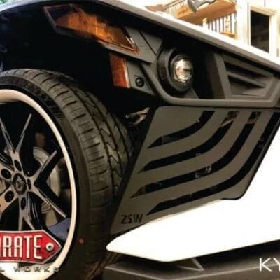 Closeup photo of a white bumper and tire