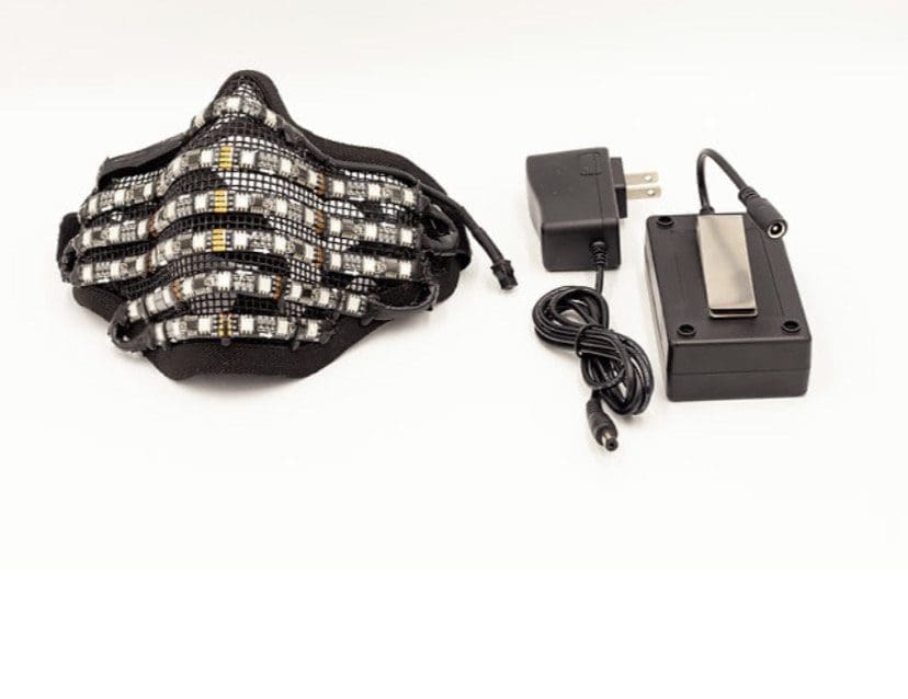 LED strip glove with power adapter and battery pack on white background.