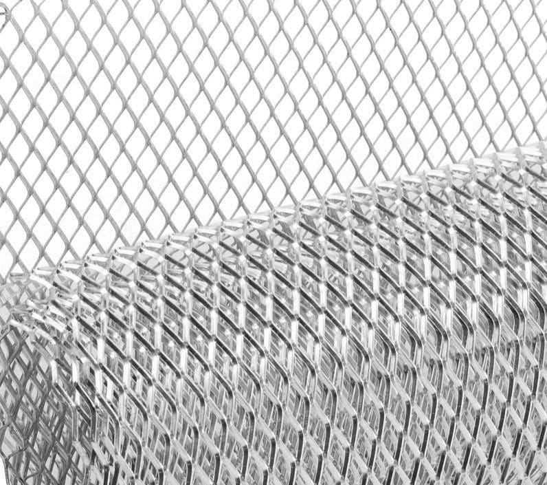 Close-up of a metallic mesh roll with diamond-shaped pattern.
