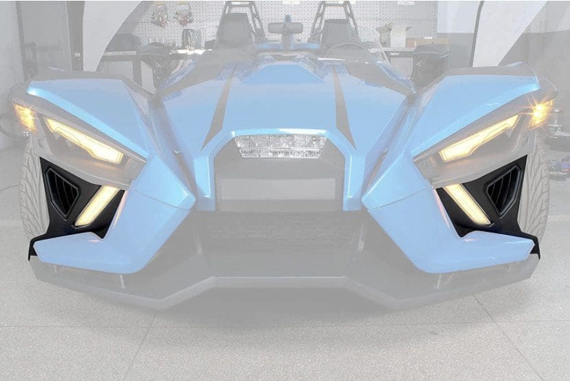IMG_4656 Futuristic blue vehicle with sleek angular design and illuminated accents.