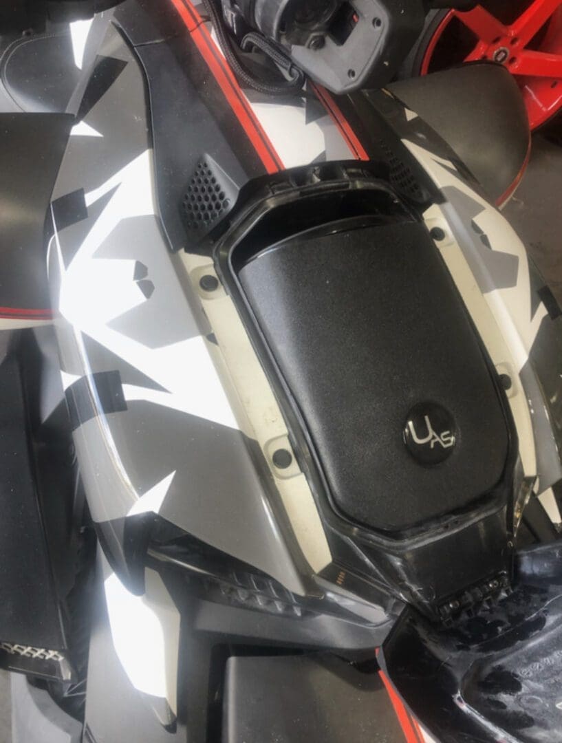 Close-up of a drone's central body and propellers.
