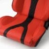 Red and black racing-style car seat with diamond stitching.