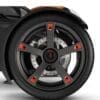 Close-up of a black wheel with red accents and detailed spokes.