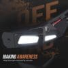 A bright bike light designed to increase visibility and awareness for drivers.