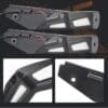 Black metal car door panels with cutouts and attachments.