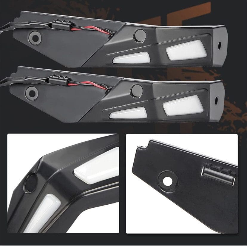 Black metal car door panels with cutouts and attachments.