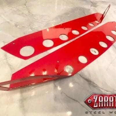 Two red parts with circles