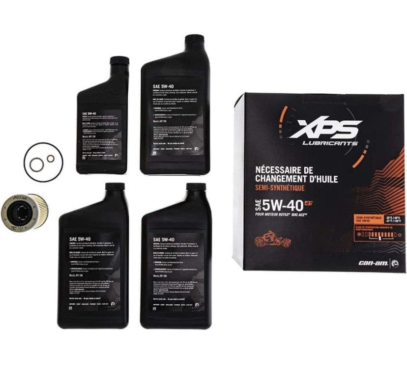 IMG_7010 Four bottles of XPS synthetic blend oil and its packaging box.