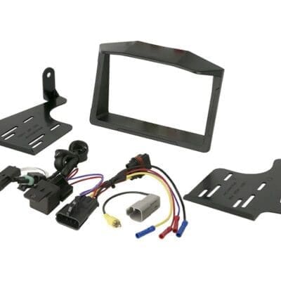 Car stereo installation kit with wiring harness and mounting brackets.