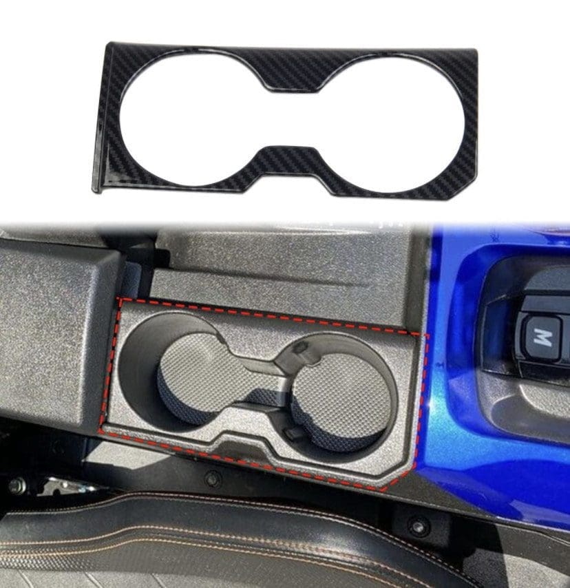 Two black circular lenses and a blue device in foam packaging.