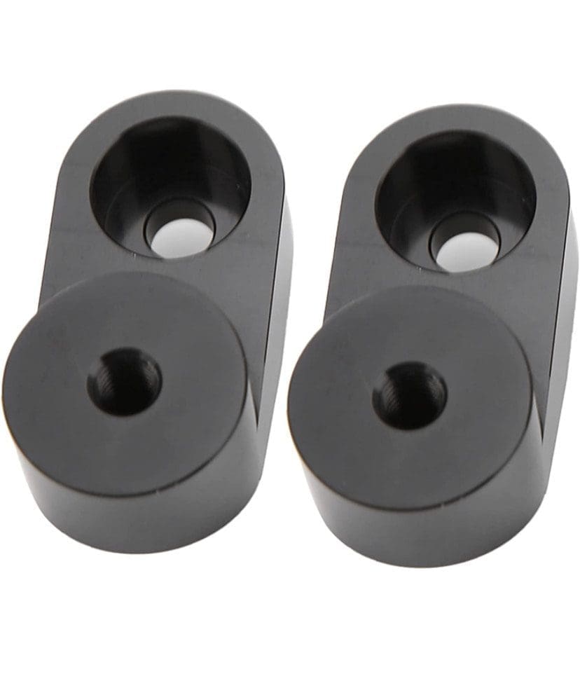 Two identical black metal mechanical parts with holes and recesses.