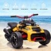 Yellow all-terrain remote-controlled vehicle on a sandy beach.
