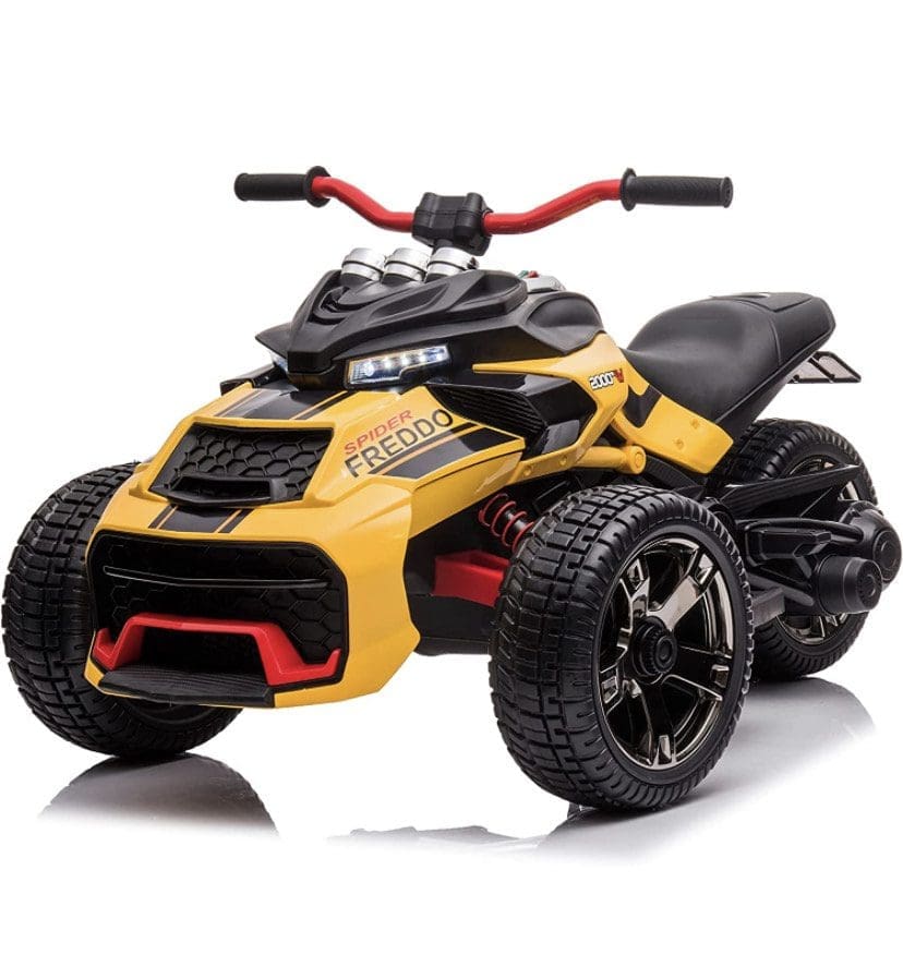 A yellow and black four-wheeled all-terrain vehicle with red handlebars.