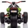 Front view of a green and black ATV with thick tires and red handlebars.