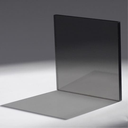 A thin, dark, transparent square casting a shadow.