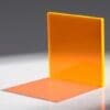 Two orange transparent acrylic sheets forming an L shape.