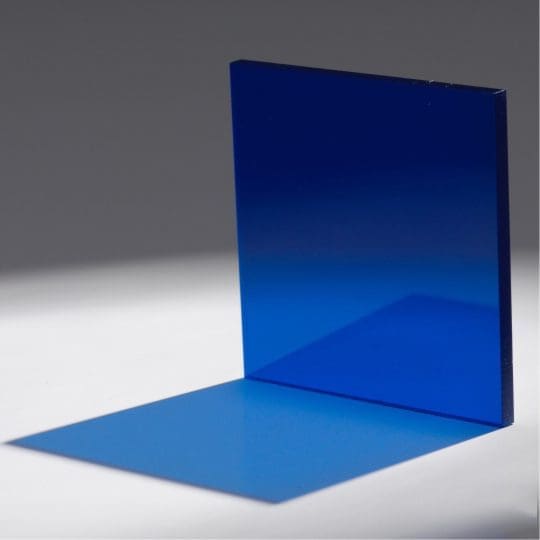 Blue transparent panels casting shadows on a white surface.