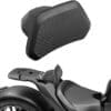 Motorcycle backrest attached to the rear seat for rider comfort.