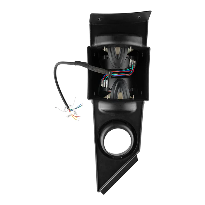 Black plastic automotive part with wiring and circular opening.
