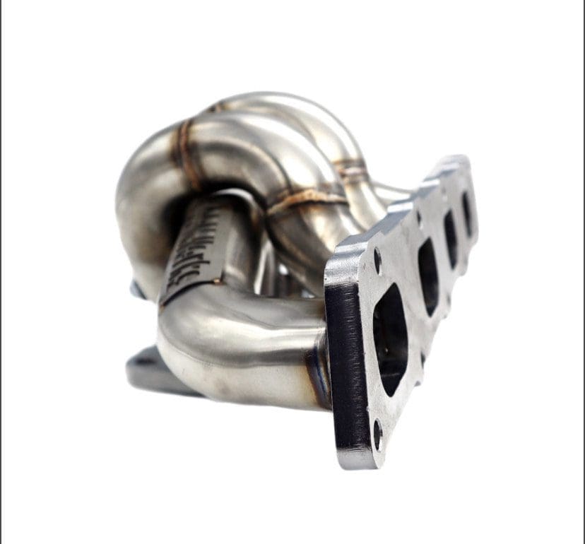 Stainless steel automotive turbo manifold with smooth bends and flanges.