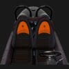 Sleek black and orange racing car seats with a modern dashboard.