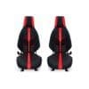 Two black and red car seats with safety belts, side by side.