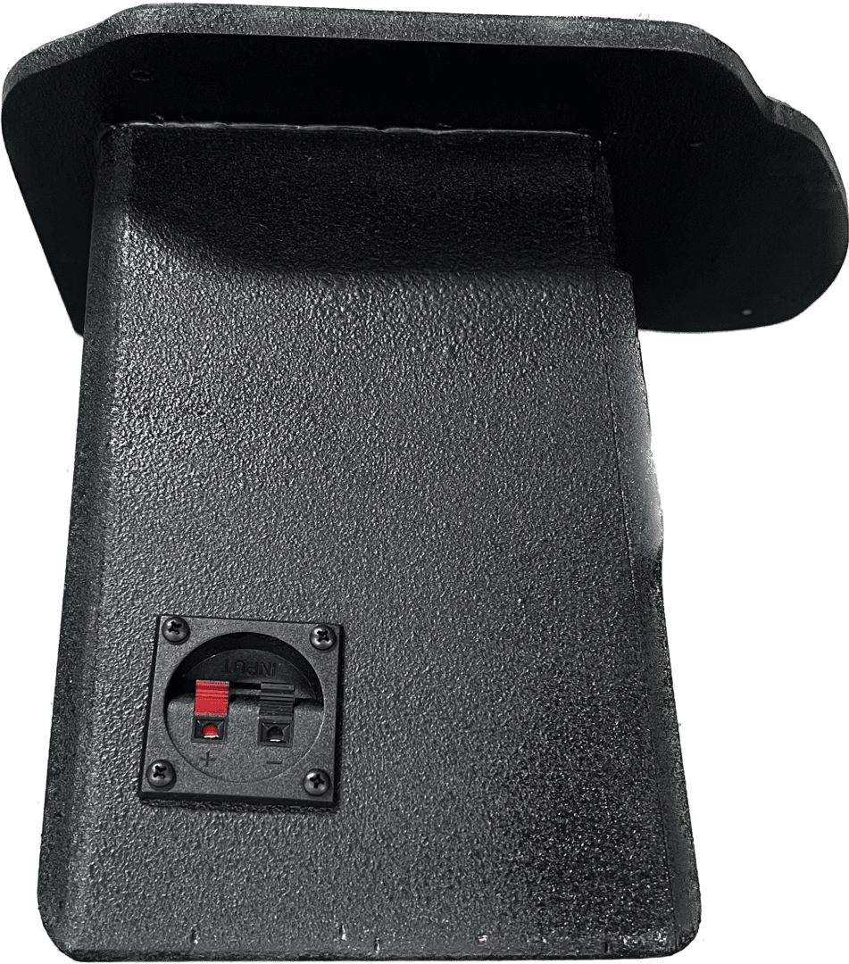 Close-up of a black plastic device with a small battery compartment.