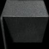 Close-up of a textured black cube with sharp edges.