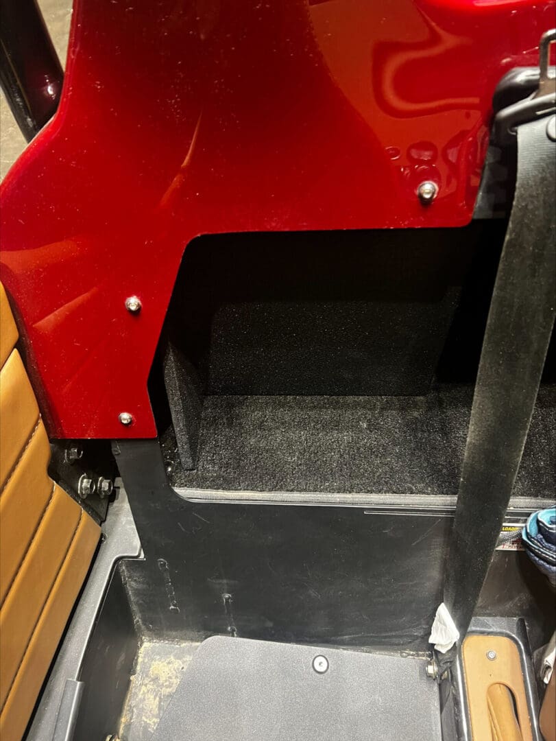 Close-up of a red and black industrial or mechanical component.