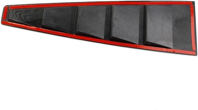 Close-up of a red and black rubber car floor mat.