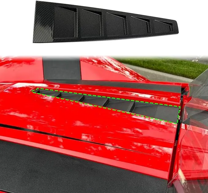 Black aerodynamic rear window louvers on a red car.