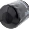 Close-up of a black oil filter with technical markings.
