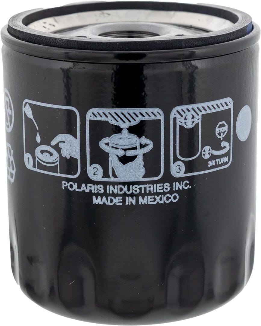 Close-up of a black oil filter with installation instructions.