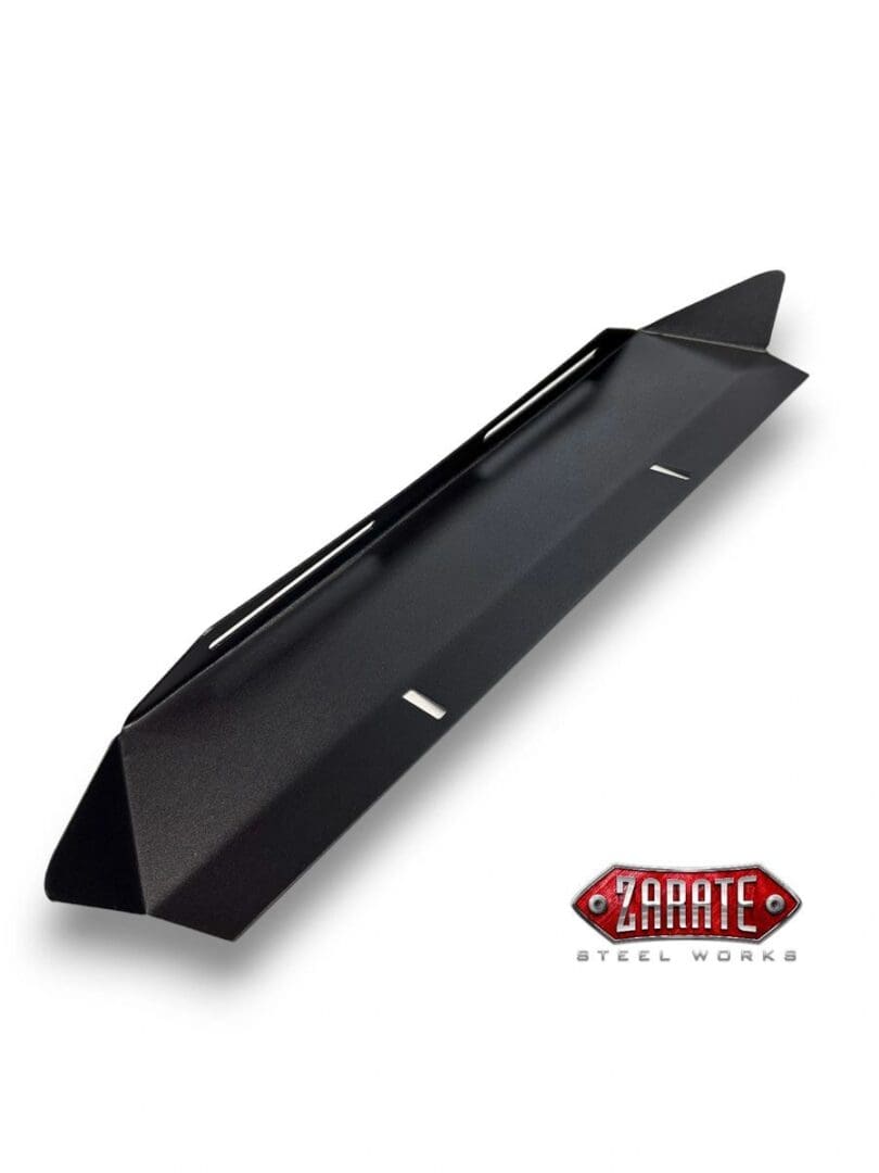Black metal truck bed side rail with a rugged design and mounting holes.