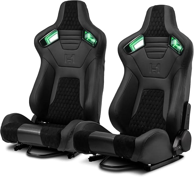 Pair of black gaming or racing seats with green accents.