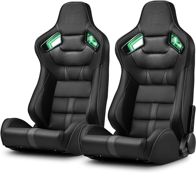 Two black racing car seats with green accents and harness holes.