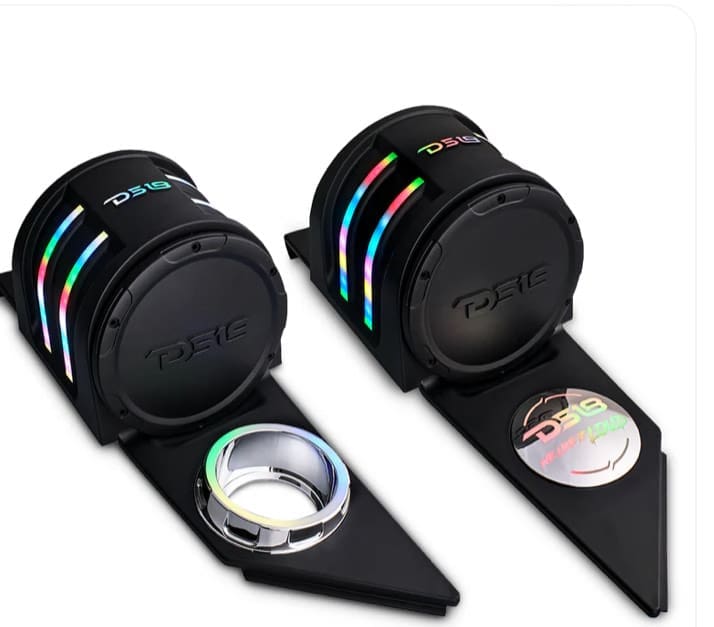Two black camera lens caps with colorful rings and attached magnifying glasses.