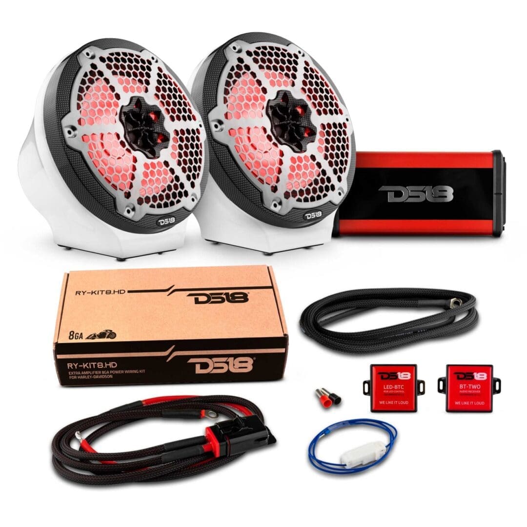 Car audio system with speakers, amplifier, and wiring kit.