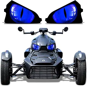 Blue three-wheeled motorcycle with headlights and rearview mirrors.